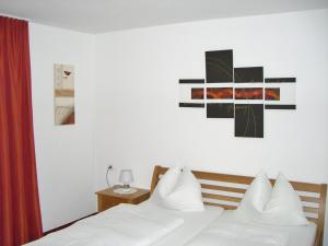 Postel nebo postele na pokoji v ubytování Haus Helga
