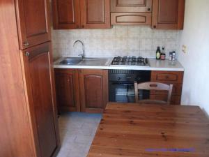 Kuchyň nebo kuchyňský kout v ubytování Agriturismo Rocce Bianche