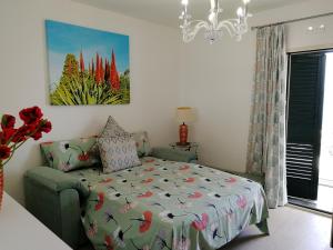 A bed or beds in a room at Le Villette - Taormina