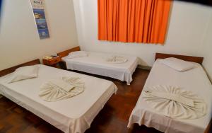 Postel nebo postele na pokoji v ubytování Hotel Indaiá