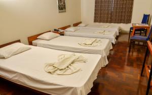 Postel nebo postele na pokoji v ubytování Hotel Indaiá