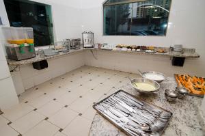 Kuchyň nebo kuchyňský kout v ubytování Hotel Indaiá