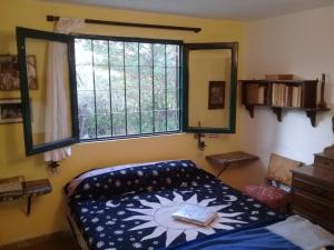 Una cama o camas en una habitación de Casa de Campo Udea