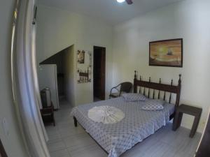 Postel nebo postele na pokoji v ubytování Morada do Aventureiro