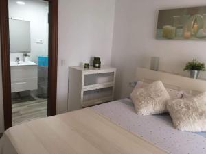 Posteľ alebo postele v izbe v ubytovaní Apartamento en la costa del sol , Fuengirola