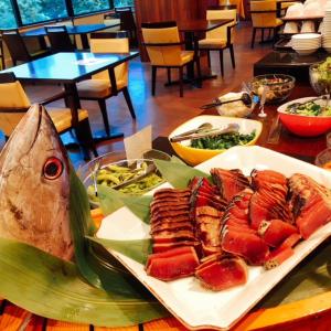 a plate of food with a fish on a table at Breezbay Lake Resort Kawaguchiko in Fujikawaguchiko