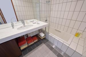 a bathroom with a sink and a bath tub at Kyoto - house / Vacation STAY 1099 in Kyoto