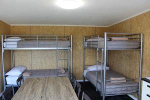 Postel nebo postele na pokoji v ubytování Levin TOP 10 Holiday Park