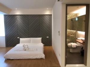 Letto o letti in una camera di 幸福圓點新北市民宿220號