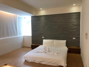 Letto o letti in una camera di 幸福圓點新北市民宿220號