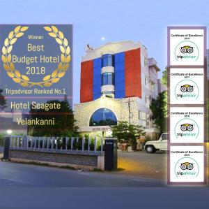 维尔尼甘尼Hotel Seagate的建筑物前的旅馆标志