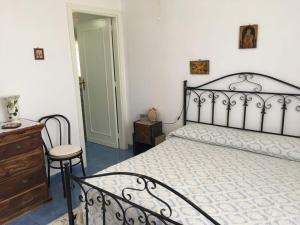 Katil atau katil-katil dalam bilik di Villa “La Giummarra” - Scivolo di Cornino
