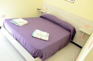 Cama o camas de una habitación en B&B Sardinia Room Siscaledda