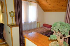 Postel nebo postele na pokoji v ubytování Bolnisi Prime House