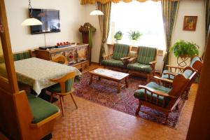 Posezení v ubytování Hotel La Müda