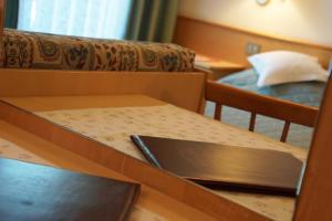 Postel nebo postele na pokoji v ubytování Hotel La Müda