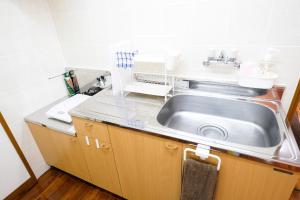 Fotografie z fotogalerie ubytování Yomitan Ocean View Apartment 402 v destinaci Yomitan