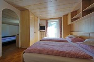 Postel nebo postele na pokoji v ubytování Hotel La Müda