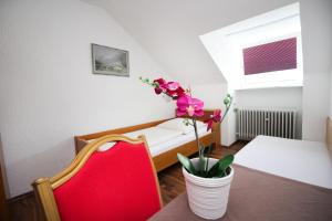 Postel nebo postele na pokoji v ubytování Hotel Olympia