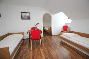 Postel nebo postele na pokoji v ubytování Hotel Olympia