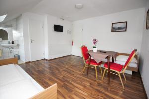 Kuchyň nebo kuchyňský kout v ubytování Hotel Olympia