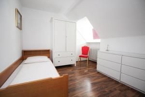 Postel nebo postele na pokoji v ubytování Hotel Olympia