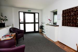 Kuchyň nebo kuchyňský kout v ubytování Hotel Olympia