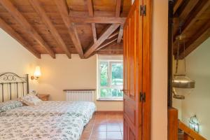 Katil atau katil-katil dalam bilik di La Torrentera de Cantabria