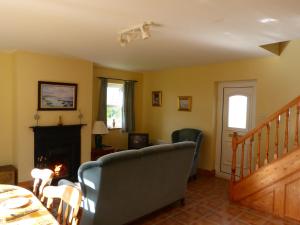 Predel za sedenje v nastanitvi Skellig Cottages