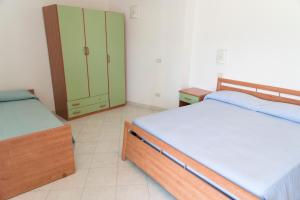 Postel nebo postele na pokoji v ubytování Hotel Eden