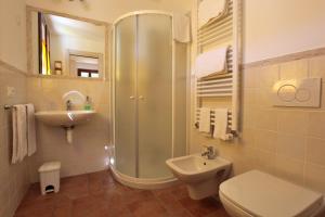 a bathroom with a shower and a sink and a toilet at B&B Ca' De Angiolina in Sanremo +40 photos