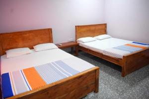 Gallery image of Yaswi Guest House in Pasikuda