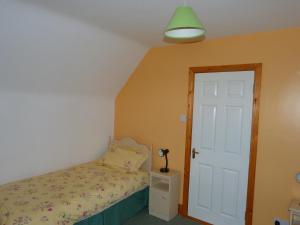 Postelja oz. postelje v sobi nastanitve Skellig Cottages