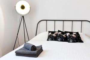 Posteľ alebo postele v izbe v ubytovaní Old Town Studio Apartment
