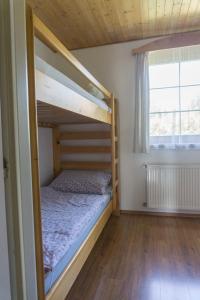 Postel nebo postele na pokoji v ubytování Holiday Villa Javornik