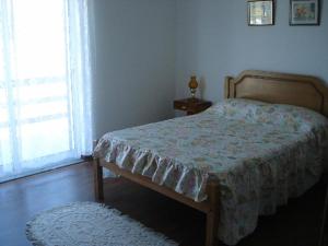 מיטה או מיטות בחדר ב-Alice´s House
