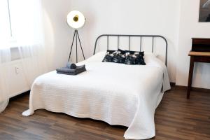 Posteľ alebo postele v izbe v ubytovaní Old Town Studio Apartment