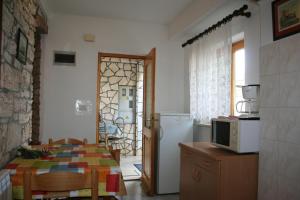 Kuchyň nebo kuchyňský kout v ubytování Apartmani Halilovic