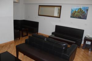 TV a/nebo společenská místnost v ubytování Hostal Bond