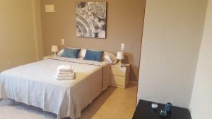 Postel nebo postele na pokoji v ubytování Hotel Castellverd