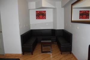 Posezení v ubytování Hostal Bond