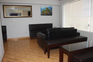 Posezení v ubytování Hostal Bond + 28 fotografií