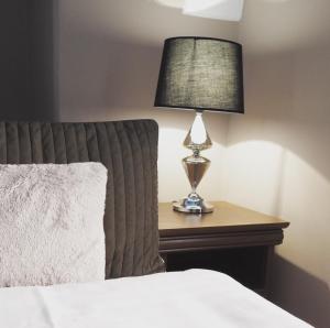 Una cama o camas en una habitación de Penzion Valtice