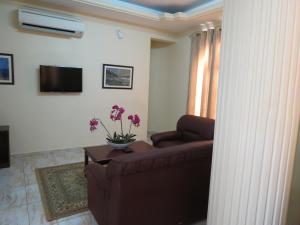TV o dispositivi per l'intrattenimento presso Al Ferdous Hotel Apartments