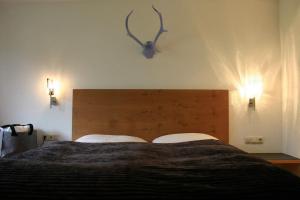 Giường trong phòng chung tại MONTAFONLodge