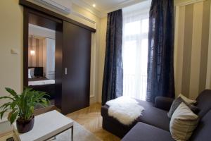 Posteľ alebo postele v izbe v ubytovaní Elisabeth Bridge Apartmans
