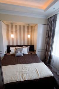 Posteľ alebo postele v izbe v ubytovaní Elisabeth Bridge Apartmans