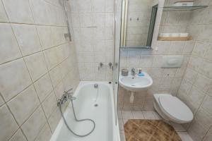 Kúpeľňa v ubytovaní Noctis Apartment Powiśle + 8 fotografií