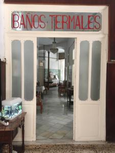a restaurant with a sign on the door at BALNEARIO LA ENCARNACIÓN in Los Alcázares