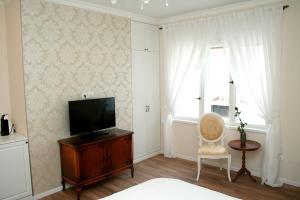 TV a/nebo společenská místnost v ubytování Banica Apartments & Rooms